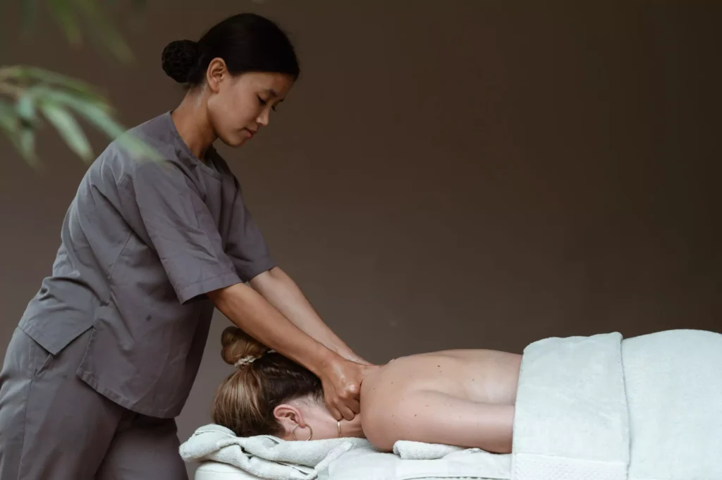 a woman getting a back massage