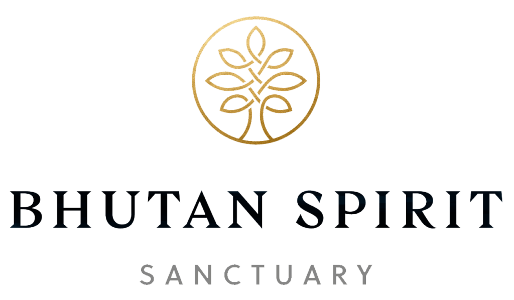 a logo with a gold circle and leaves