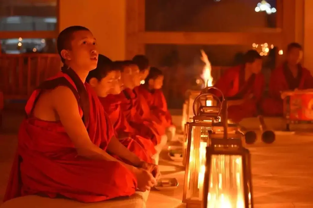 a group of people sitting in a row