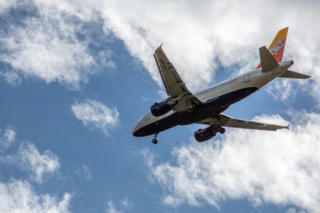 a Bhutanese plane flying in the sky