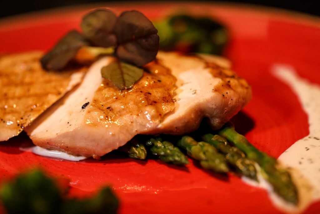 a plate of food on a red plate